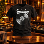 Spinning Wax Vinyl Records t-shirt on a stand in a vinyl bar behind DJ turntables - vinyl record print, GitGraf