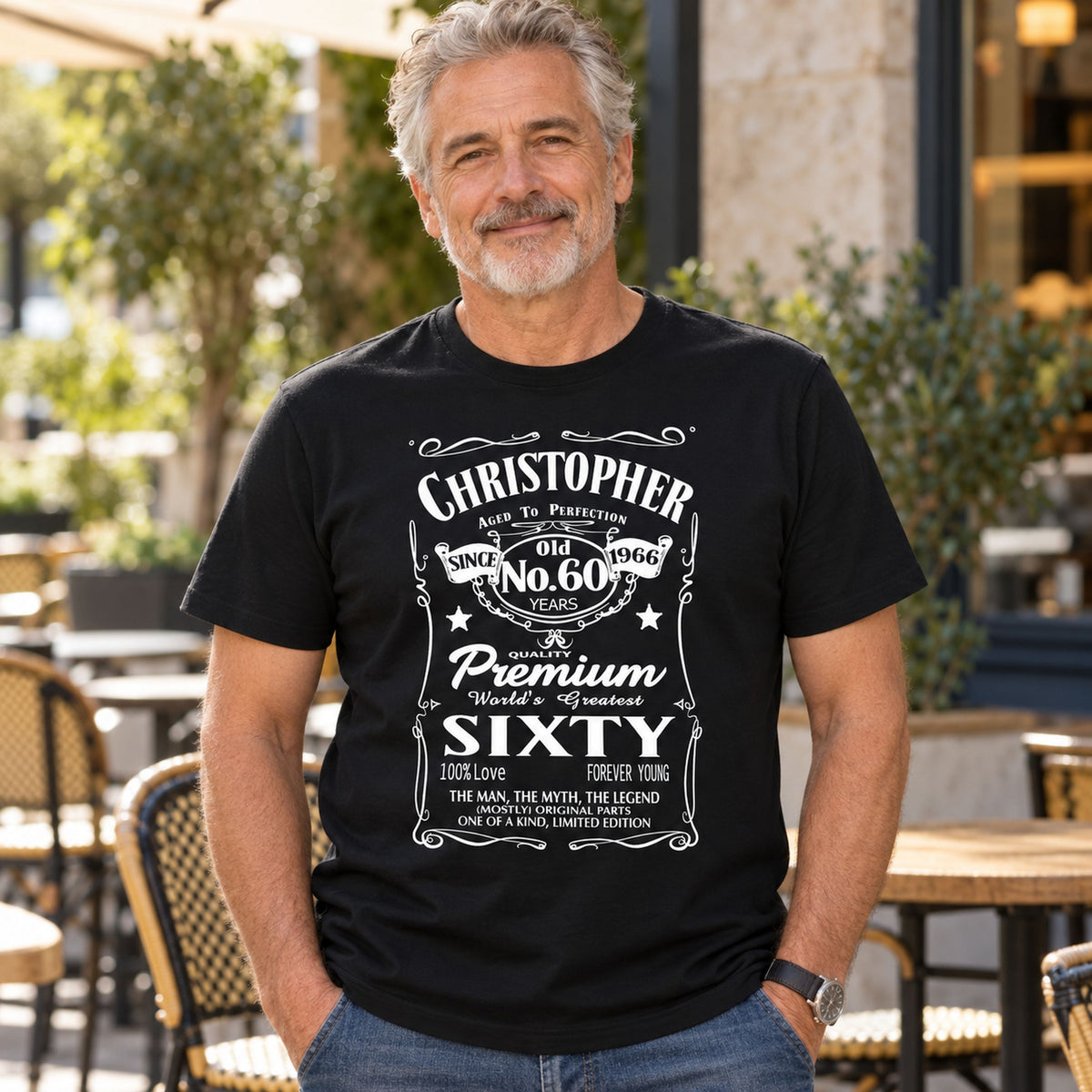 Christopher wearing a black personalised 60th birthday T-shirt with name, 60 years and 1966 - custom gift for him