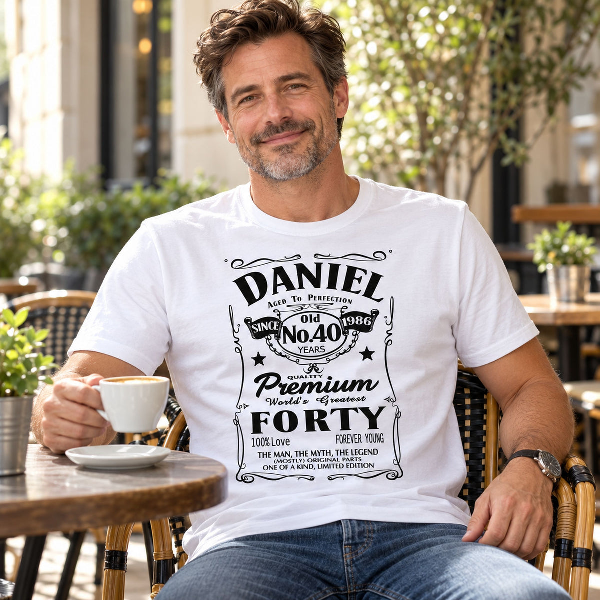 Daniel wearing a white personalised 40th birthday T-shirt with name, 40 years and 1986 - custom gift for him