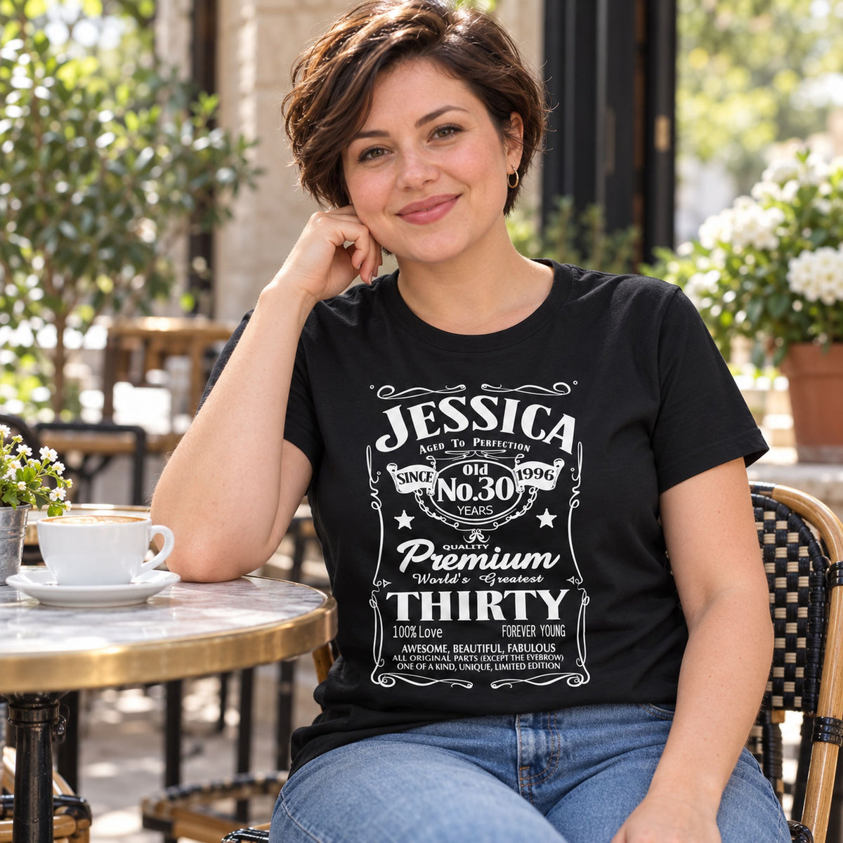 Jessica wearing a black personalised 30th birthday T-shirt with name, 30 years and 1996 - custom gift for her