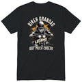 Black Biker Grandad Legend Shirt t-shirt - bearded biker in a helmet and sunglasses on a motorcycle, the word LEGEND and a orange paint splash, gift for grandad