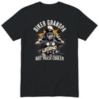 Black Biker Grandpa Legend Shirt t-shirt - bearded biker in a helmet and sunglasses on a motorcycle, the word LEGEND and a orange paint splash, gift for grandpa