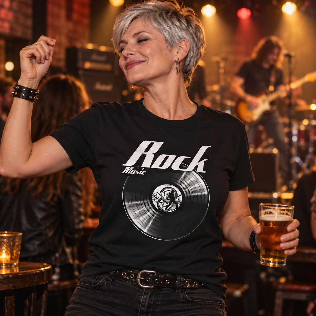 Rock Music Vinyl Records t-shirt in black - woman with a pint dancing at a rock gig, a guitarist on stage behind her, gift for rock fans