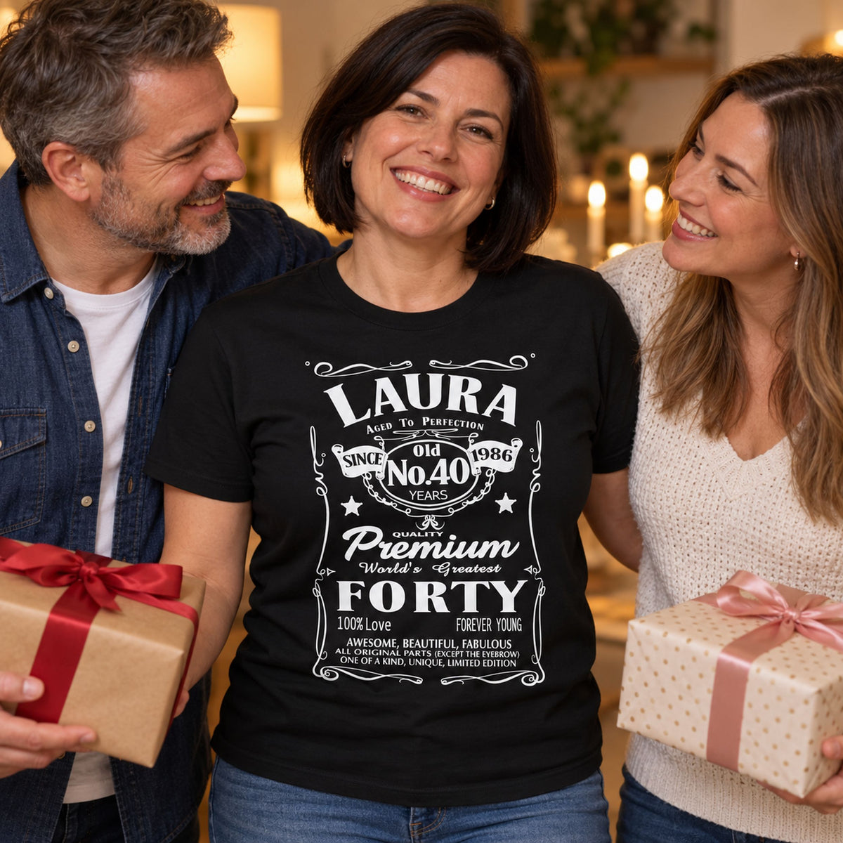 Real example: Laura in a black T-shirt printed with her name, 40 years and year 1986 - personalised birthday shirt