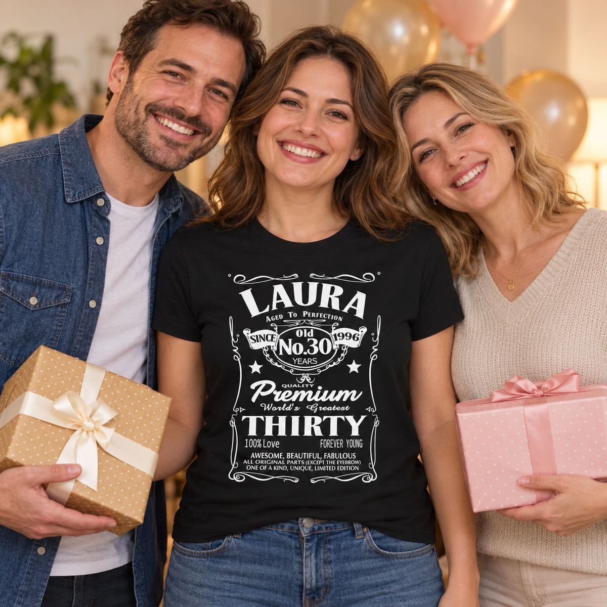Real example: Laura in a black T-shirt printed with her name, 30 years and year 1996 - personalised birthday shirt