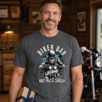Biker Dad Legend t-shirt in charcoal - dad holding a present in a garage with motorcycles, Father's Day gift