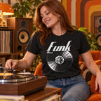 Funk Music Vinyl Records t-shirt in black - woman putting a record on in a colourful 70s-style living room, gift for funk fans