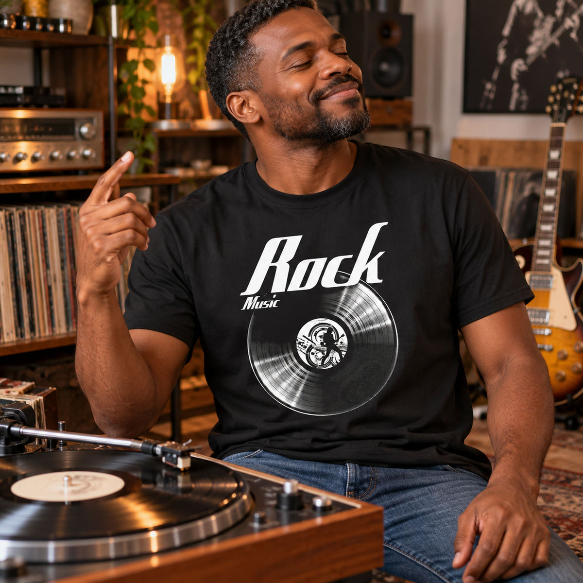 Rock Music Vinyl Records t-shirt in black - man by a turntable at home with electric guitars on the wall, gift for rock fans