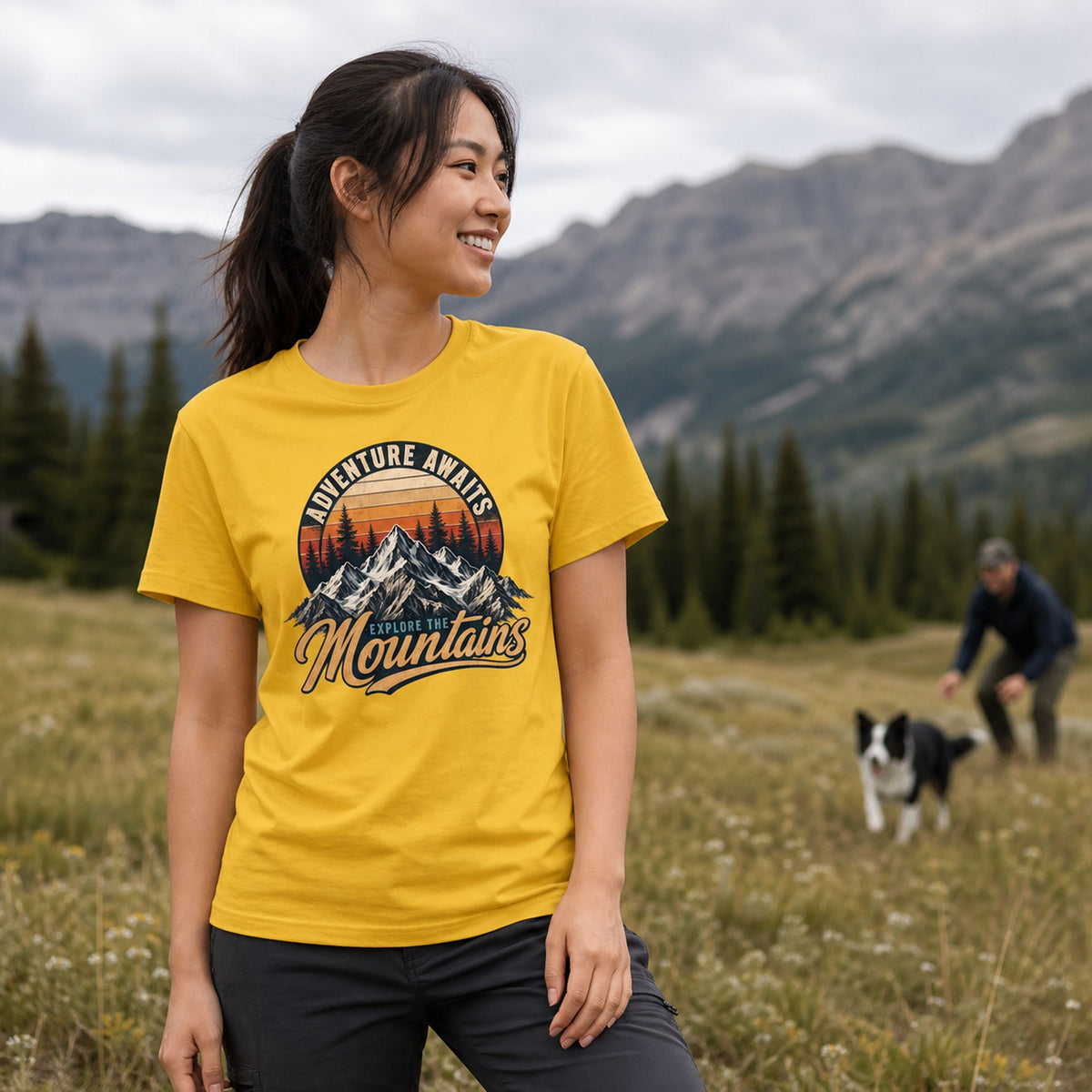 Adventure Awaits Explore the Mountains t-shirt in yellow - woman on a mountain meadow with a dog, gift for hikers