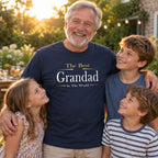 Grandad in a navy The Best Grandad In The World Exclusive t-shirt with three grandkids in the garden at golden hour
