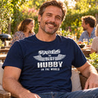 The Best Hubby In The World wings T-shirt in navy - man relaxing at an evening garden party with friends, funny gift for him from his wife