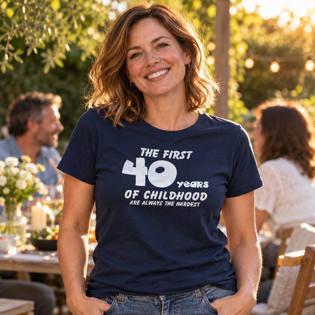 The First 40 Years of Childhood T-shirt in navy - woman at an evening garden party with friends, funny 40th birthday shirt