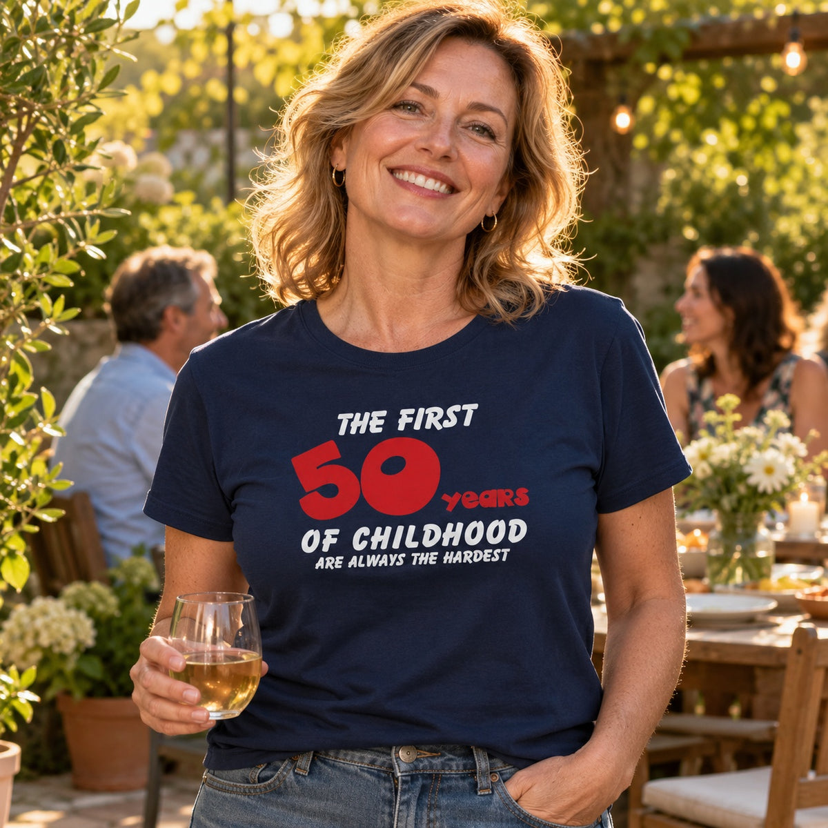 The First 50 Years of Childhood T-shirt in navy with a red 50 - woman with a glass of wine at a garden party, funny 50th birthday shirt