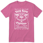 Pink unisex T-shirt with personalised Real Queen name and age retro label printed on the front