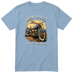 Light Blue Born to Ride motorcycle t-shirt - blue vintage motorcycle on a dirt track with a forest sunset behind, gift for a biker
